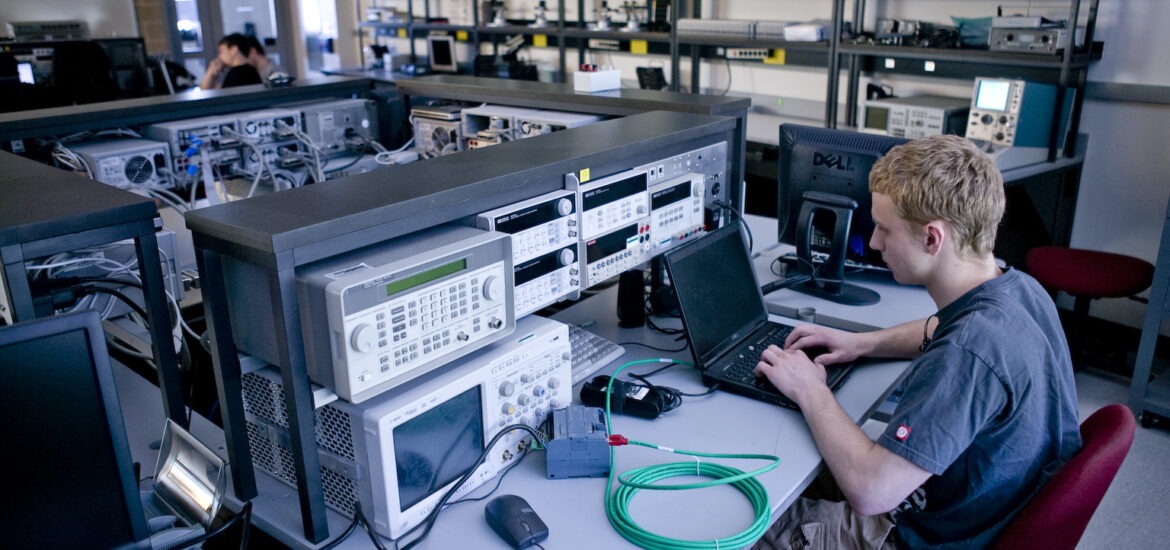 A student works on his computer.