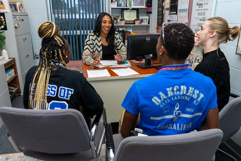 students in a room for counseling