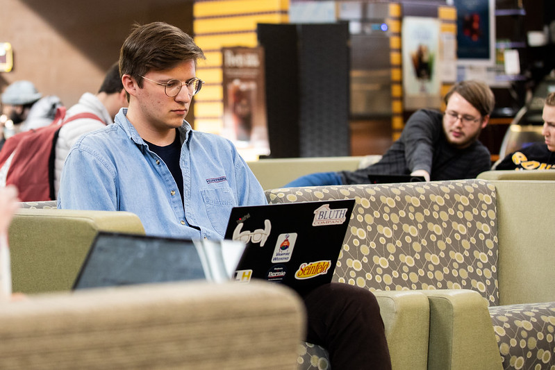 student using his computer